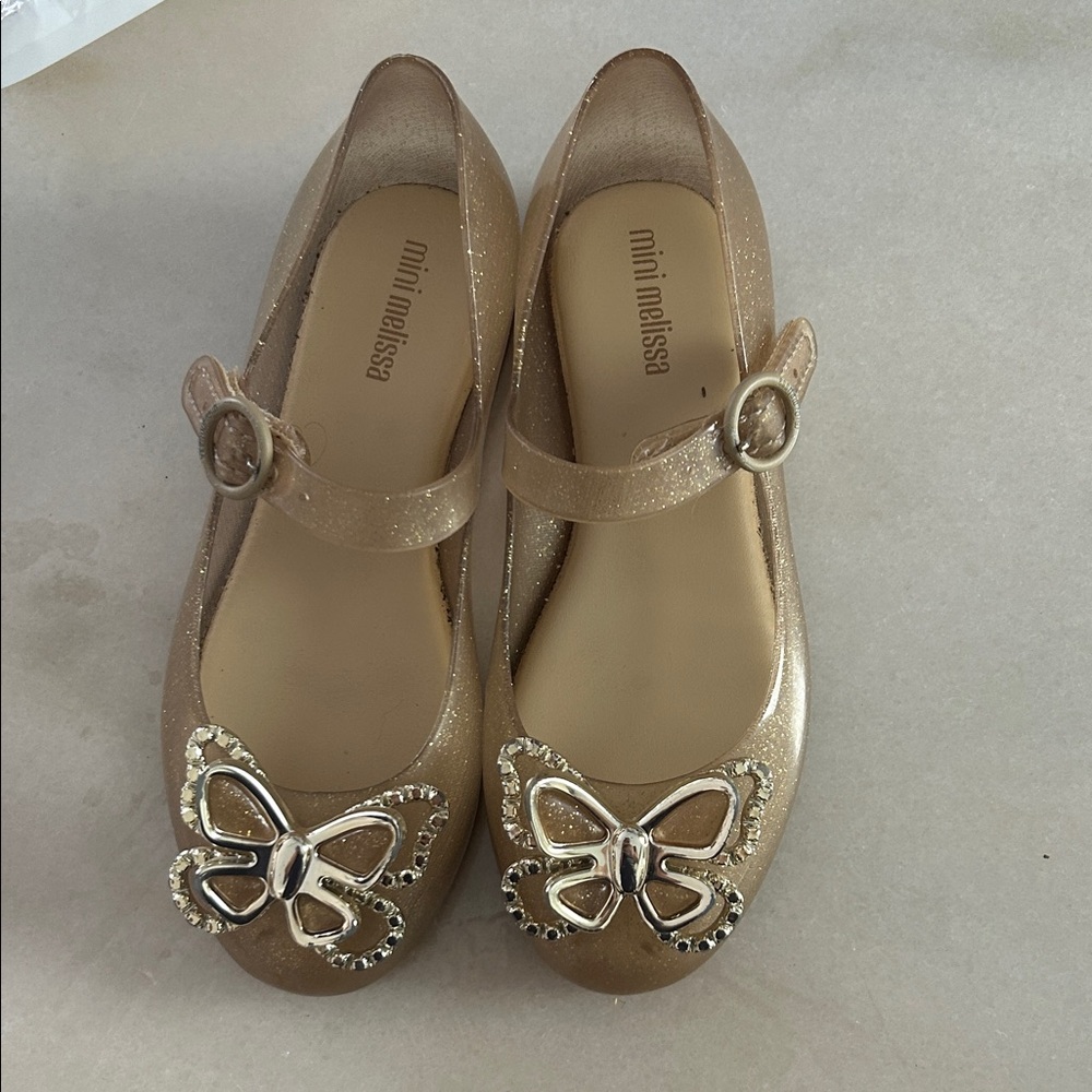 Mini Melissa Sparkling Gold Mary Janes with Butterfly